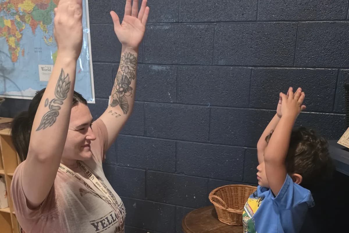 A teacher and child together at SquareOne Early Learning Center