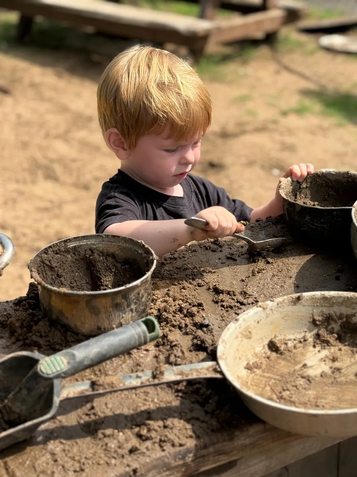 Digging in the mud kitchen